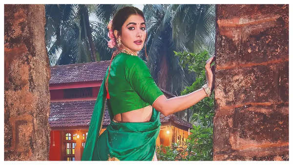 Pooja Hegde shines in a pink and green lehenga draped like a sari Hegde