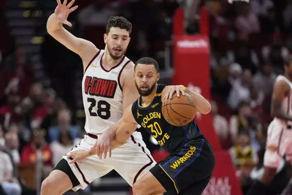 Golden State Warriors vs Houston Rockets. Image via: David J. Phillip/ AP Golden State Warriors vs Houston Rockets