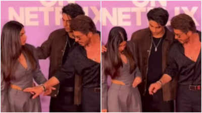 Shah Rukh Khan sweetly fixes daughter Suhana Khan's dress at event, showcases their heartwarming bond