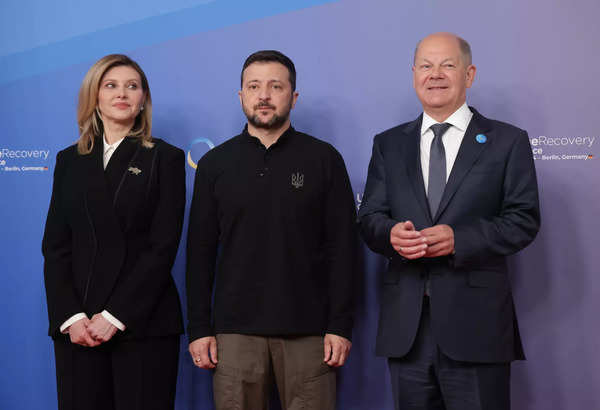 BERLIN, GERMANY - JUNE 11: German Chancellor Olaf Scholz (R), Ukrainian President Volodymyr Zelensky and Ukrainian First Lady Olena Zelenska arrive for the 2024 Ukraine Recovery Conference on June 11, 2024 in Berlin, Germany. The two-day conference is bringing together international representatives from politics, business and civil society working towards the recovery, reconstruction and modernization of Ukraine in the face of Russia's ongoing war. (Photo by Sean Gallup/Getty Images) Berlin Hosts Ukraine Recovery Conference