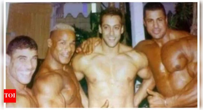 Salman Khan proudly flaunts his ripped body as he poses shirtless with bodybuilders in old viral photo; fans call him 'good-looking man' |