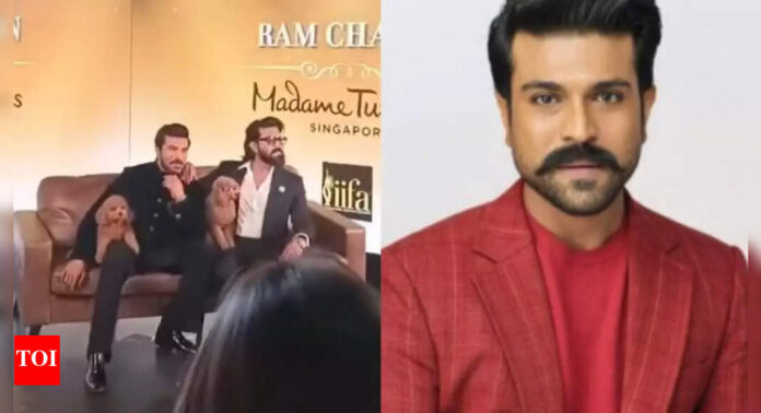 Ram Charan reveals his Wax statue in London; hid furry pal Rhyme steals the show | Telugu Movie News