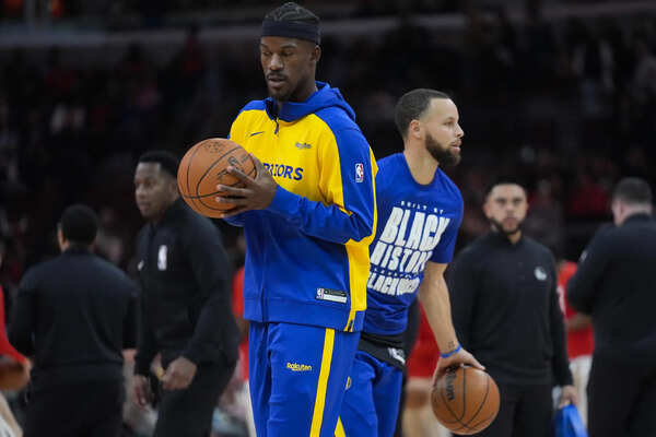 Golden State Warriors forward Jimmy Butler, left, and guard Stephen Curry, right, warm up before an NBA basketball game against the Chicago Bulls, Saturday, Feb. 8, 2025, in Chicago. (Image via AP Photo/Erin Hooley) Golden State Warriors might benefit from bagging Malik Beasley