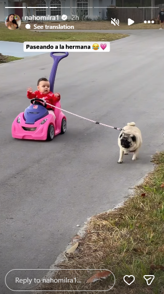 Nahomi and Francisco's daughter with their pet dog